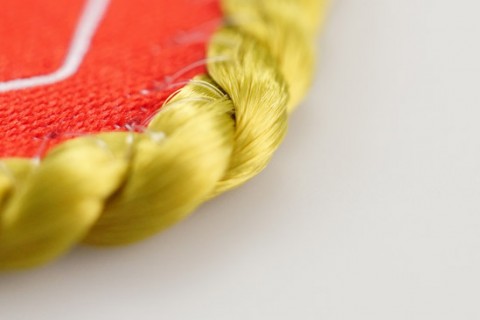 Custom pennant cord border design detail